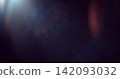 Abstract cinematic lens flare overlay texture featuring soft optical reflections, blue light artifacts and subtle glow on a black background. Premium VFX asset for compositing and film editing. Abstract cinematic lens flare overlay texture featuring soft optical reflections, blue light artifacts and subtle glow on a black background. Premium VFX asset for compositing and film editing. 142093032