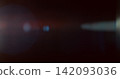 Cinematic lens flare overlay featuring soft optical reflections, subtle blue and warm orange light artifacts and realistic glow on a black background. Premium VFX asset for film compositing. Cinematic lens flare overlay featuring soft optical reflections, subtle blue and warm orange light artifacts and realistic glow on a black background. Premium VFX asset for film compositing. 142093036