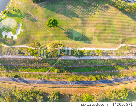 Aerial view drone shot of beautiful golf field in Phuket Thailand Aerial view drone shot of beautiful golf field in Phuket Thailand 142093571