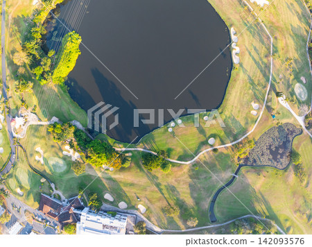 Aerial view drone shot of beautiful golf field in Phuket Thailand Aerial view drone shot of beautiful golf field in Phuket Thailand 142093576