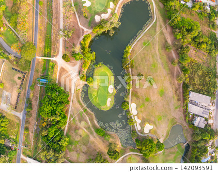 Aerial view drone shot of beautiful golf field in Phuket Thailand Aerial view drone shot of beautiful golf field in Phuket Thailand 142093591