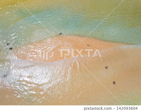 Bird eye view photo of sea beach water surface texture background Bird eye view photo of sea beach water surface texture background 142093604