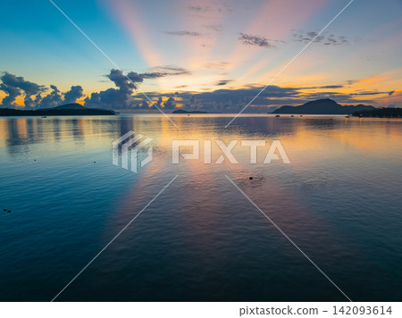 Amazing light of nature beautiful Light Sunset or sunrise over sea sky background 142093614