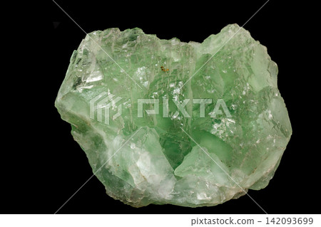 Macro stone Fluorite mineral on black background Macro stone Fluorite mineral on black background 142093699