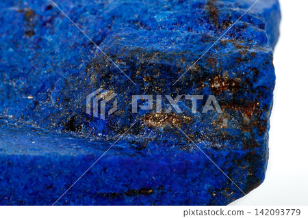 Macro Azurite mineral stone with Pyrite inserts on a white background Macro Azurite mineral stone with Pyrite inserts on a white background 142093779