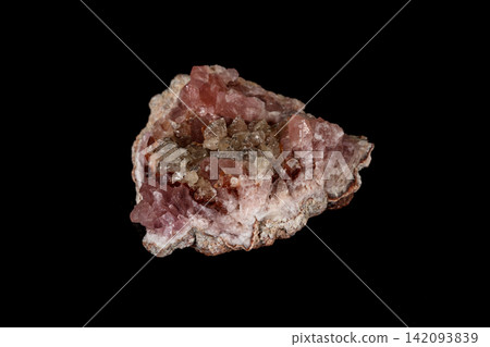 Macro mineral stone Pink Amethyst on a black background Macro mineral stone Pink Amethyst on a black background 142093839