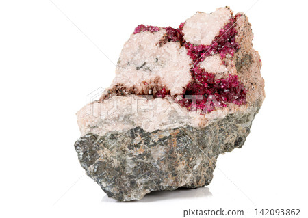 Macro stone Erythrite mineral on white background 142093862