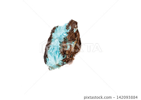 Macro mineral aurichalcite stone on microcline on white background Macro mineral aurichalcite stone on microcline on white background 142093884