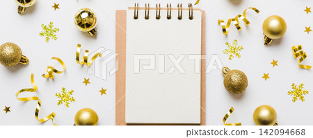 Christmas blank greeting card mock-up scene. Creative layout made of Christmas tree branches and paper card note. Flat lay. Nature New Year concept Christmas blank greeting card mock-up scene. Creative layout made of Christmas tree branches and paper card note. Flat lay. Nature New Year concept 142094668