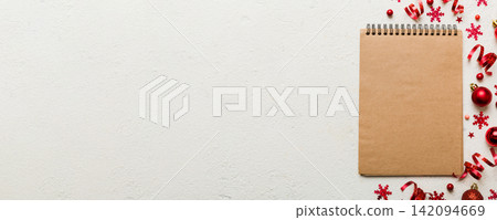 Christmas blank greeting card mock-up scene. Creative layout made of Christmas toy and paper card note. Flat lay. Nature New Year concept Christmas blank greeting card mock-up scene. Creative layout made of Christmas toy and paper card note. Flat lay. Nature New Year concept 142094669