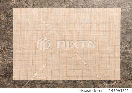 Top view of light tablecloth for food on cement background. Empty space for your design Top view of light tablecloth for food on cement background. Empty space for your design 142095225