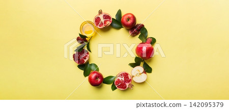 Rosh hashanah concept. Frame made of symbols jewish New Year holiday Traditional. Top view with copy space Rosh hashanah concept. Frame made of symbols jewish New Year holiday Traditional. Top view with copy space 142095379