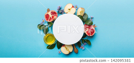 Flat lay composition with Blank flyer poster and symbols jewish Rosh Hashanah holiday attributes on colored background, New Year holiday Traditional. Top view with copy space mock up Flat lay composition with Blank flyer poster and symbols jewish Rosh Hashanah holiday attributes on colored background, New Year holiday Traditional. Top view with copy space mock up 142095381