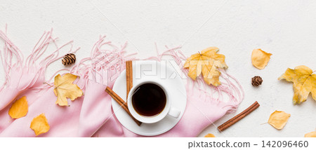 Flat lay composition with colorful Autumn cup of coffee and leaves on a color background. top view Flat lay composition with colorful Autumn cup of coffee and leaves on a color background. top view 142096460