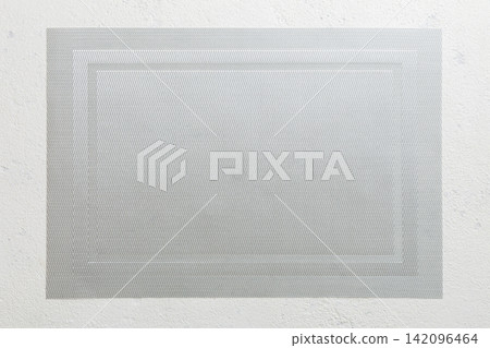 Top view of grey tablecloth for food on cement background. Empty space for your design Top view of grey tablecloth for food on cement background. Empty space for your design 142096464