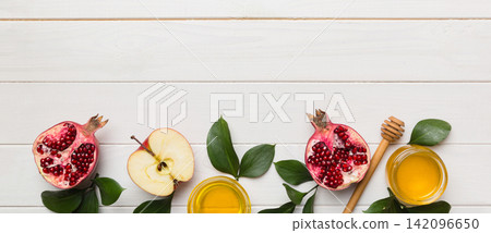 Flat lay composition with symbols jewish Rosh Hashanah holiday attributes on colored background, Rosh hashanah concept. New Year holiday Traditional. Top view with copy space Flat lay composition with symbols jewish Rosh Hashanah holiday attributes on colored background, Rosh hashanah concept. New Year holiday Traditional. Top view with copy space 142096650