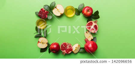 Rosh hashanah concept. Frame made of symbols jewish New Year holiday Traditional. Top view with copy space Rosh hashanah concept. Frame made of symbols jewish New Year holiday Traditional. Top view with copy space 142096656