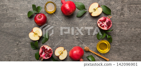 Rosh hashanah concept. Frame made of symbols jewish New Year holiday Traditional. Top view with copy space Rosh hashanah concept. Frame made of symbols jewish New Year holiday Traditional. Top view with copy space 142096901