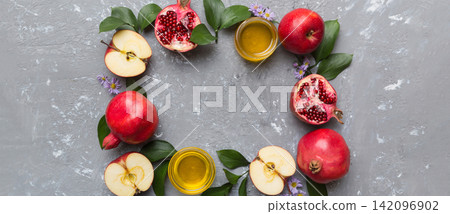 Rosh hashanah concept. Frame made of symbols jewish New Year holiday Traditional. Top view with copy space Rosh hashanah concept. Frame made of symbols jewish New Year holiday Traditional. Top view with copy space 142096902