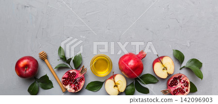 Flat lay composition with symbols jewish Rosh Hashanah holiday attributes on colored background, Rosh hashanah concept. New Year holiday Traditional. Top view with copy space Flat lay composition with symbols jewish Rosh Hashanah holiday attributes on colored background, Rosh hashanah concept. New Year holiday Traditional. Top view with copy space 142096903