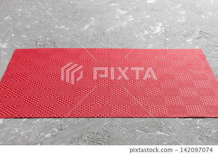 Perspective view of red tablecloth for food on cement background. Empty space for your design Perspective view of red tablecloth for food on cement background. Empty space for your design 142097074