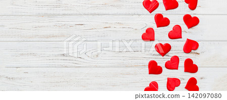 Valentine day background with red hearts, top view with copy space Valentine day background with red hearts, top view with copy space 142097080
