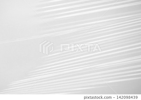 Abstract white plastic film wrap texture background Abstract white plastic film wrap texture background 142098439