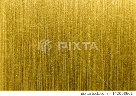 Luxury shiny gold foil surface texture background Luxury shiny gold foil surface texture background 142098661