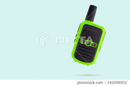 Walkie talkie isolated on blue background Walkie talkie isolated on blue background 142098932