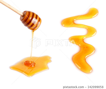 Honey stick with flowing honey isolated on white background Honey stick with flowing honey isolated on white background 142099058