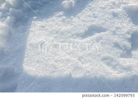 Close up of white snow surface with texture Close up of white snow surface with texture 142099793
