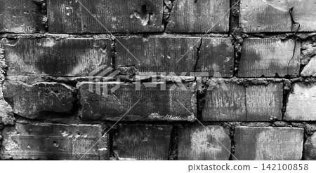 Black and white worn brick wall texture background Black and white worn brick wall texture background 142100858