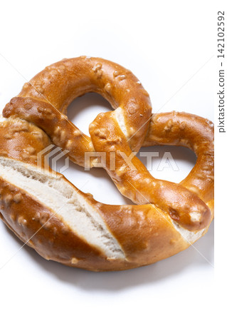 Traditional soft pretzels isolated on white background Traditional soft pretzels isolated on white background 142102592