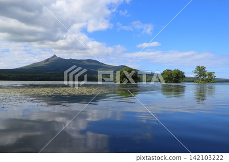 Summer view of Mt. Komagatake from the shore of Lake Onuma Summer view of Mt. Komagatake from the shore of Lake Onuma 142103222