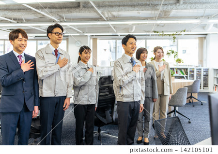 Six business people with their hands on their hearts Six business people with their hands on their hearts 142105101