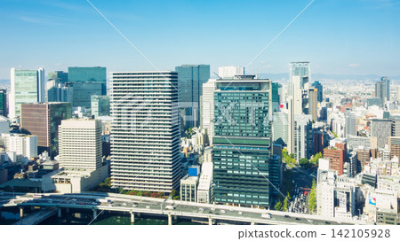 A panoramic view of the Nakanoshima skyscrapers and main roads on a clear autumn day. A panoramic view of the Nakanoshima skyscrapers and main roads on a clear autumn day. 142105928