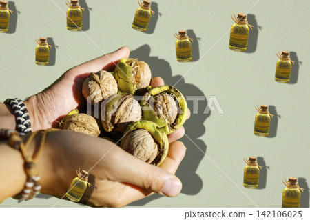 Liquid Gold: Dynamic Levitation Pattern of Walnut Oil Bottles and Farmer Hands Liquid Gold: Dynamic Levitation Pattern of Walnut Oil Bottles and Farmer Hands 142106025