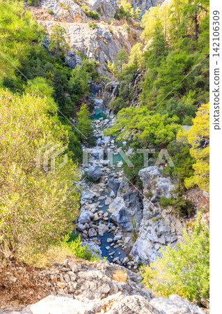 View of a mountain river in Goynuk canyon in Antalya province, Turkey. View from above View of a mountain river in Goynuk canyon in Antalya province, Turkey. View from above 142106309