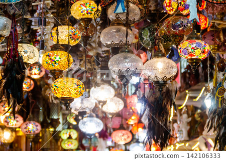 Turkish mosaic lamps or Moroccan lanterns at store. Shop of oriental souvenirs Turkish mosaic lamps or Moroccan lanterns at store. Shop of oriental souvenirs 142106333