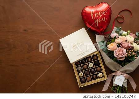 a box of chocolates and cookies in a box a box of chocolates and cookies in a box 142106747