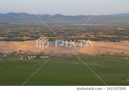 Landscape of sand dunes and grasslands in Bulgaria, Mongolia Landscape of sand dunes and grasslands in Bulgaria, Mongolia 142107089