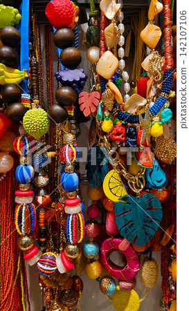 Colorful Handmade Jewelry and Beaded Accessories at a Craft Market Colorful Handmade Jewelry and Beaded Accessories at a Craft Market 142107106