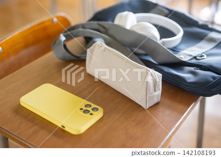 Student belongings placed on the desk Student belongings placed on the desk 142108193