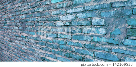 Bright turquoise brick wall texture. 142109533