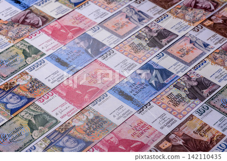 Iceland, Icelandic paper banknotes krona for settlements and financial transactions. Icelandic krona Iceland, Icelandic paper banknotes krona for settlements and financial transactions. Icelandic krona 142110435