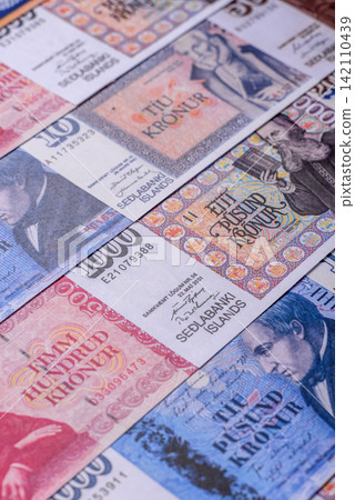 Iceland, Icelandic paper banknotes krona for settlements and financial transactions. Icelandic krona Iceland, Icelandic paper banknotes krona for settlements and financial transactions. Icelandic krona 142110439
