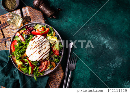 Salad with fresh burrata cheese, grilled peaches and blueberry Salad with fresh burrata cheese, grilled peaches and blueberry 142111529
