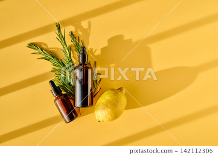 Natural skincare essence oil dropping bottles with rosemary lemon Natural skincare essence oil dropping bottles with rosemary lemon 142112306