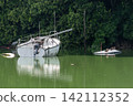 A yacht abandoned in the river 142112352