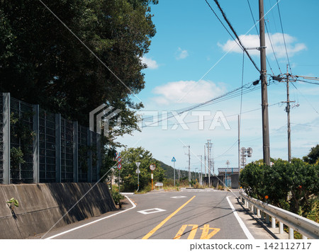 A road running through rural areas: Naoshima Island in Kagawa Prefecture - a nostalgic, film-like feel. A road running through rural areas: Naoshima Island in Kagawa Prefecture - a nostalgic, film-like feel. 142112717